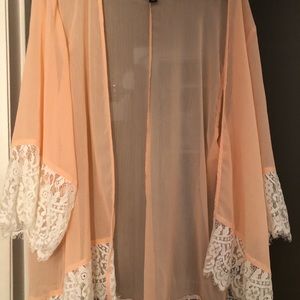 Peach sheer kimono with lace bottom.